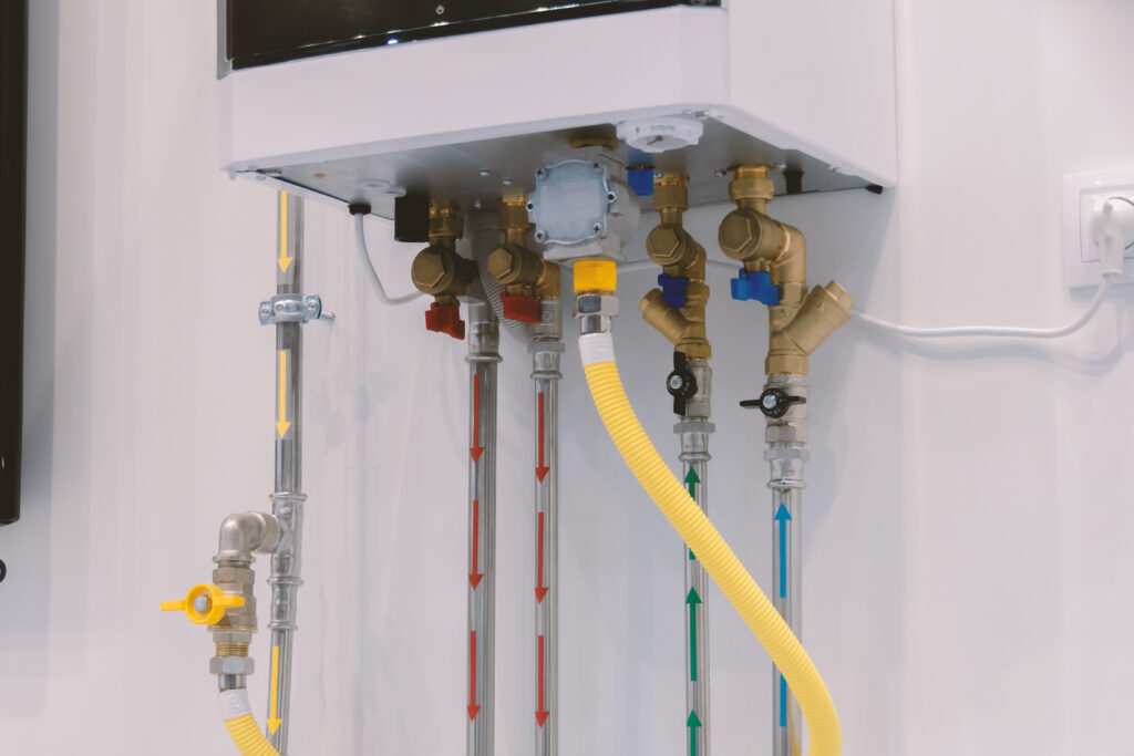 Home heating and water heating system. Double boiler. Connecting pipes to the heating boiler