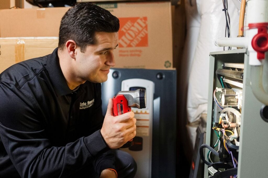 heating installation Smock HVAC worker installing water heater