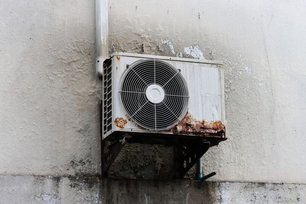 hvac troubleshooting ac not running but not cooling house rusty old air conditioner on wall