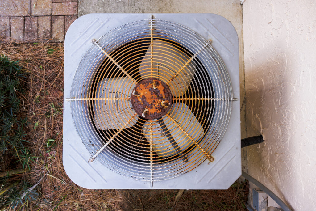 Rusty HVAC air conditioner in need of repair.