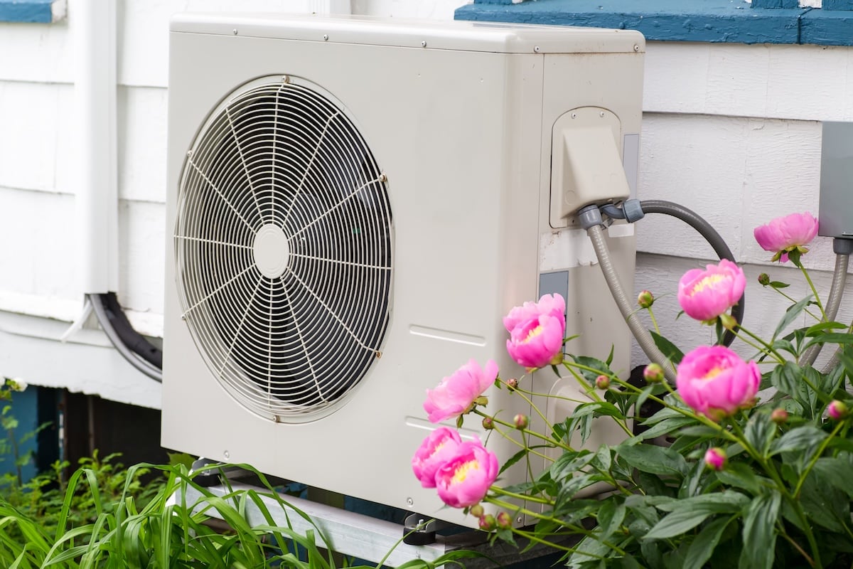 Air conditioning/ Heat pump unit on the side of a home