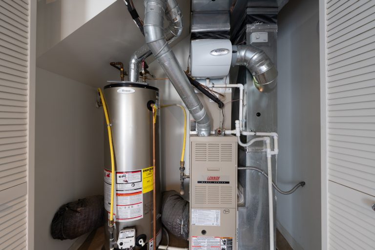 home has been updated with a new residential furnace and hot water tank installed in the basement